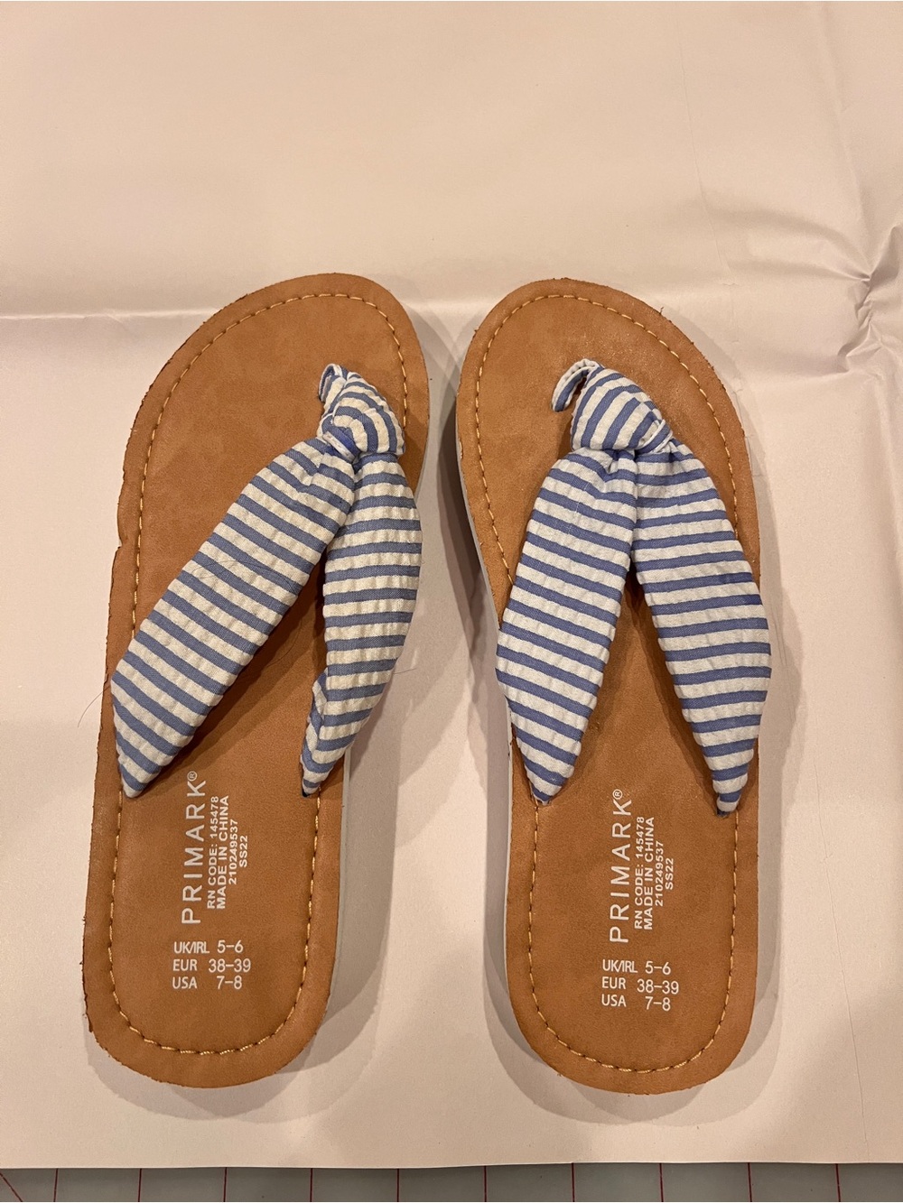 Primark blue and white flip flops. Size 7/8. Never worn.